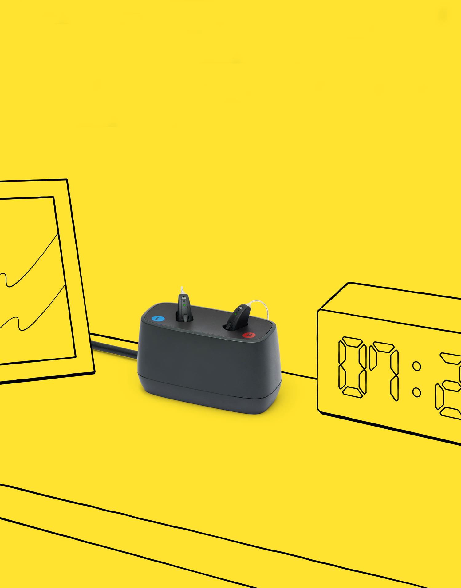 Interton Move rechargeable hearing aids and the desktop charger.