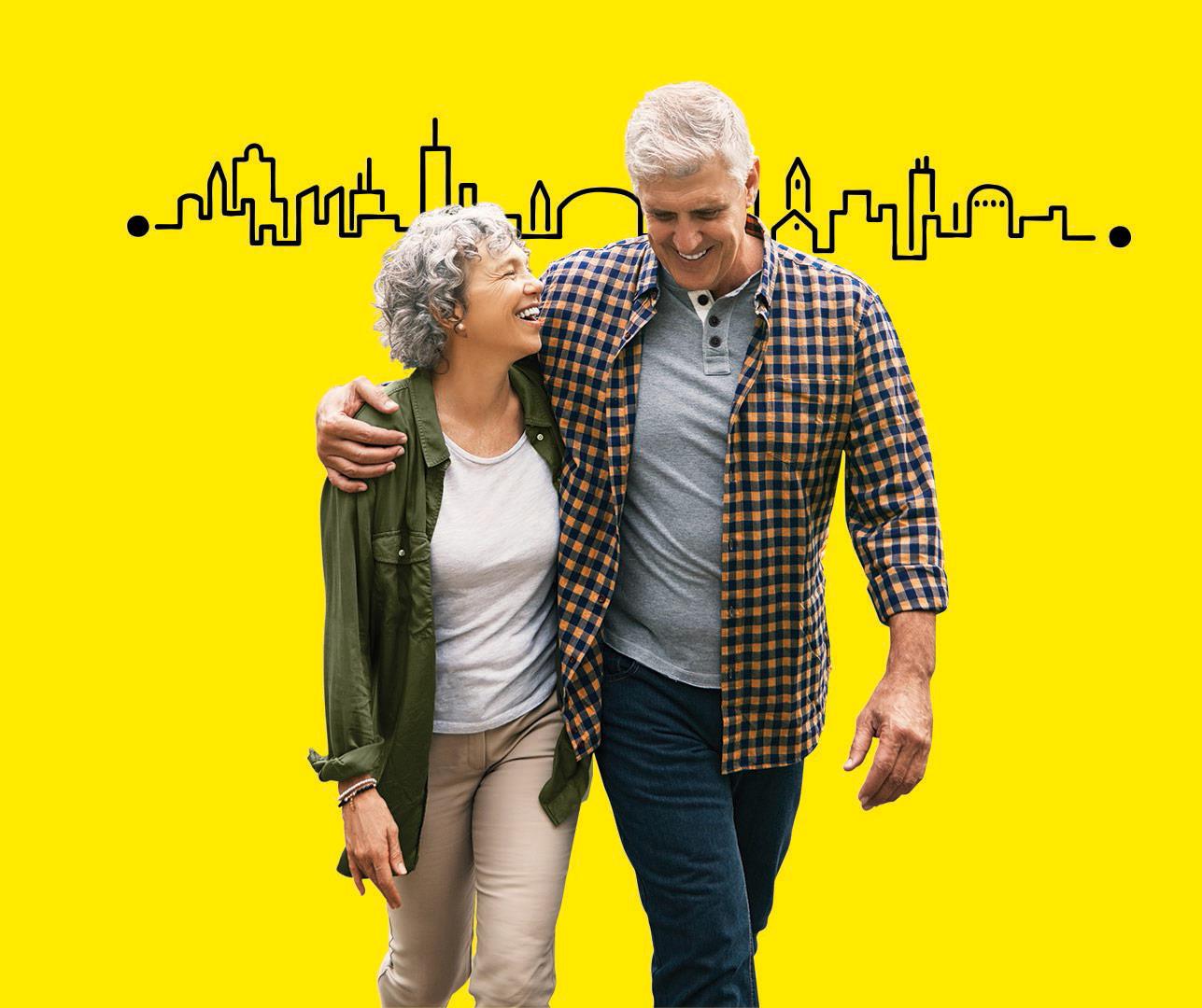 Couple enjoying the freedom by using Interton Move rechargeable hearing aid.