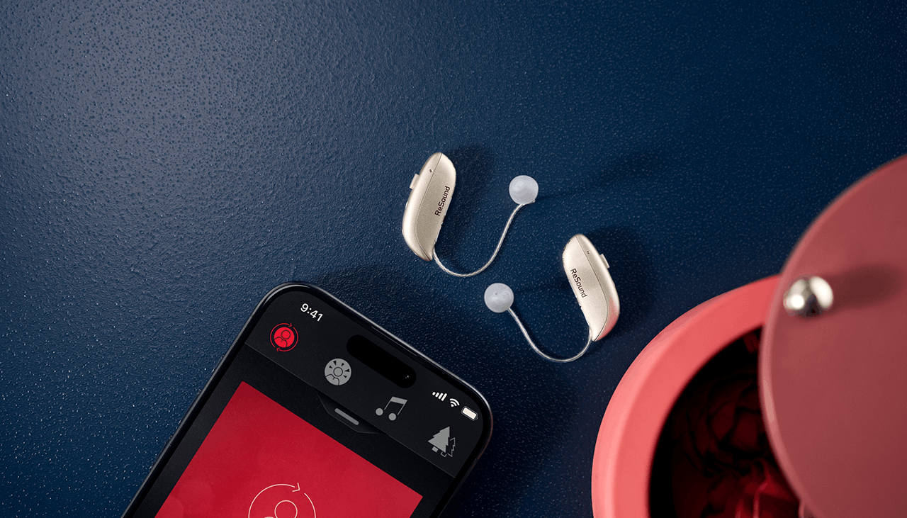 ReSound hearing aids and mobile displaying ReSound Smart 3D app